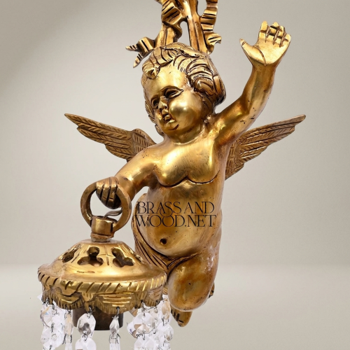 Baroque Brass Cherub Putto Wall Sconce with Crystal Icicle Pendants and Ribbon Crown Brass and Wood Antique gold Front | Brass & Wood