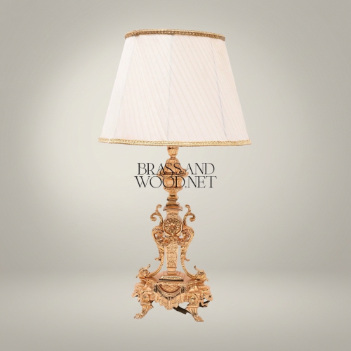 Baroque Handcrafted Brass Table Lamp Ornate Scrollwork Tripod Base Off-White Empire Shade Brass and Wood Gold Front | Brass & Wood