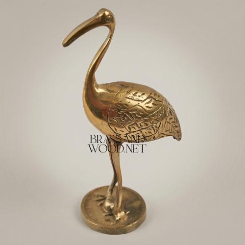 Handcrafted Brass Crane Sculpture with Engraved Foliage Body