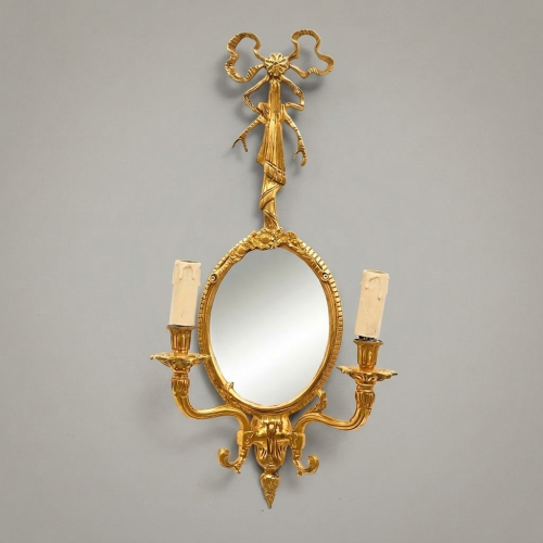 Neoclassical Brass Wall Sconce Oval Mirror Bow Crest Twin Candle Arms Brass and Wood Gold Front | Brass & Wood