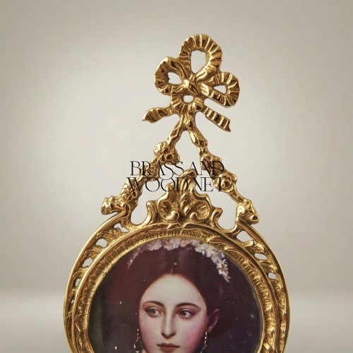 Rococo Brass Double Portrait Medallion Wall Frame with Ribbon Crest