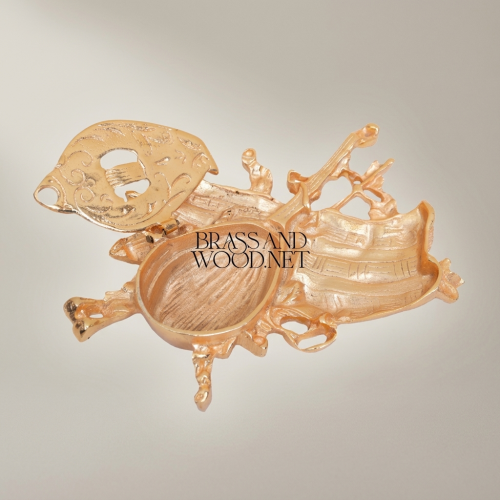 Rococo Brass Sculptural Ashtray with Musical Instruments and Boat Relief Motifs Gold Front | Brass & Wood